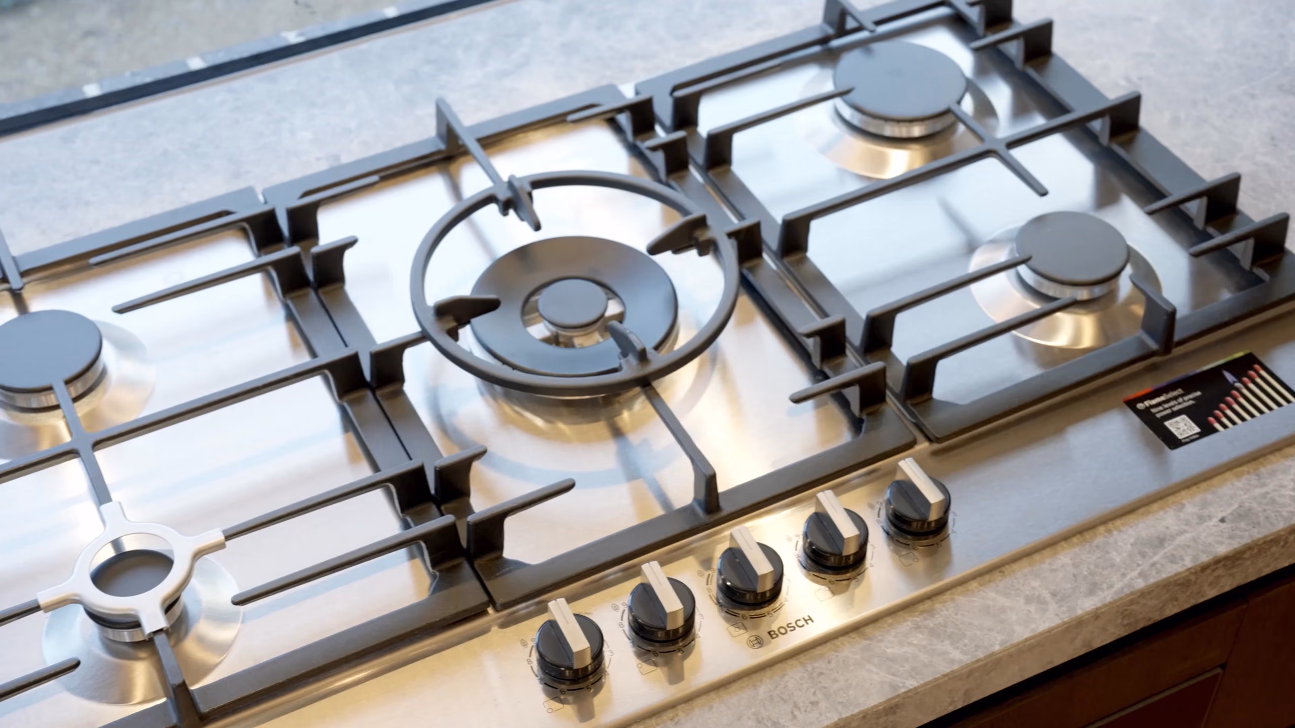 Longmere gas cooktop set into the stone benchtop