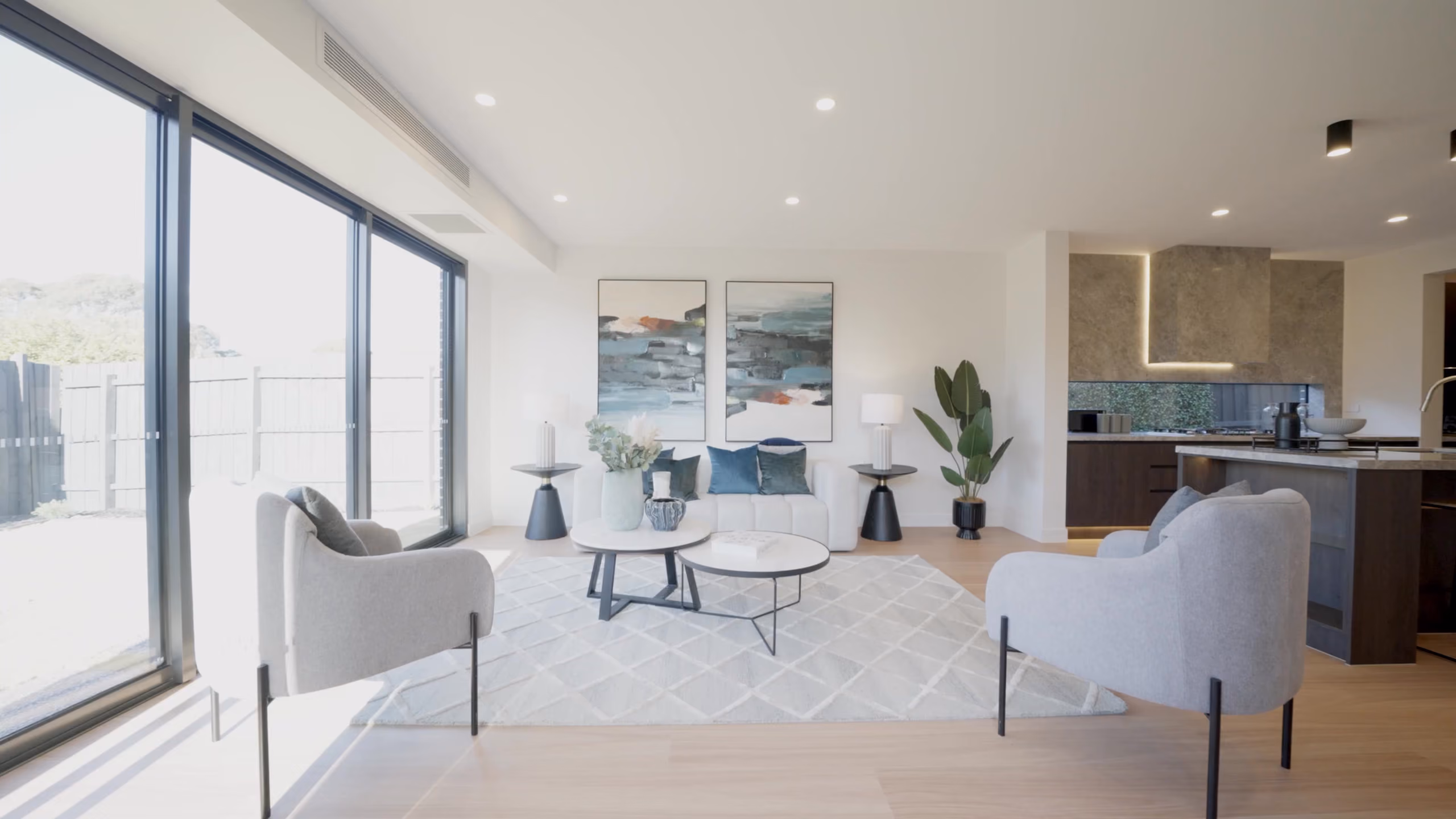 Longmere living room with sliding doors to the deck
