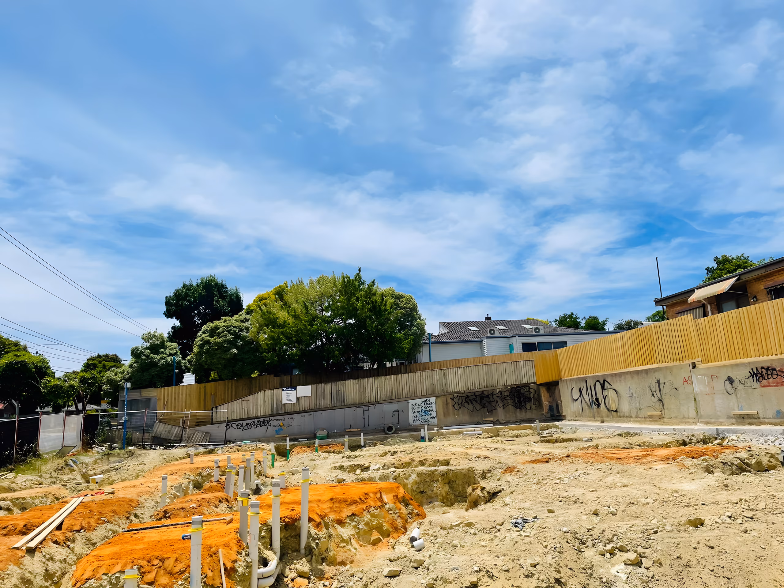 Box Hill North apartments under construction behind the site fence