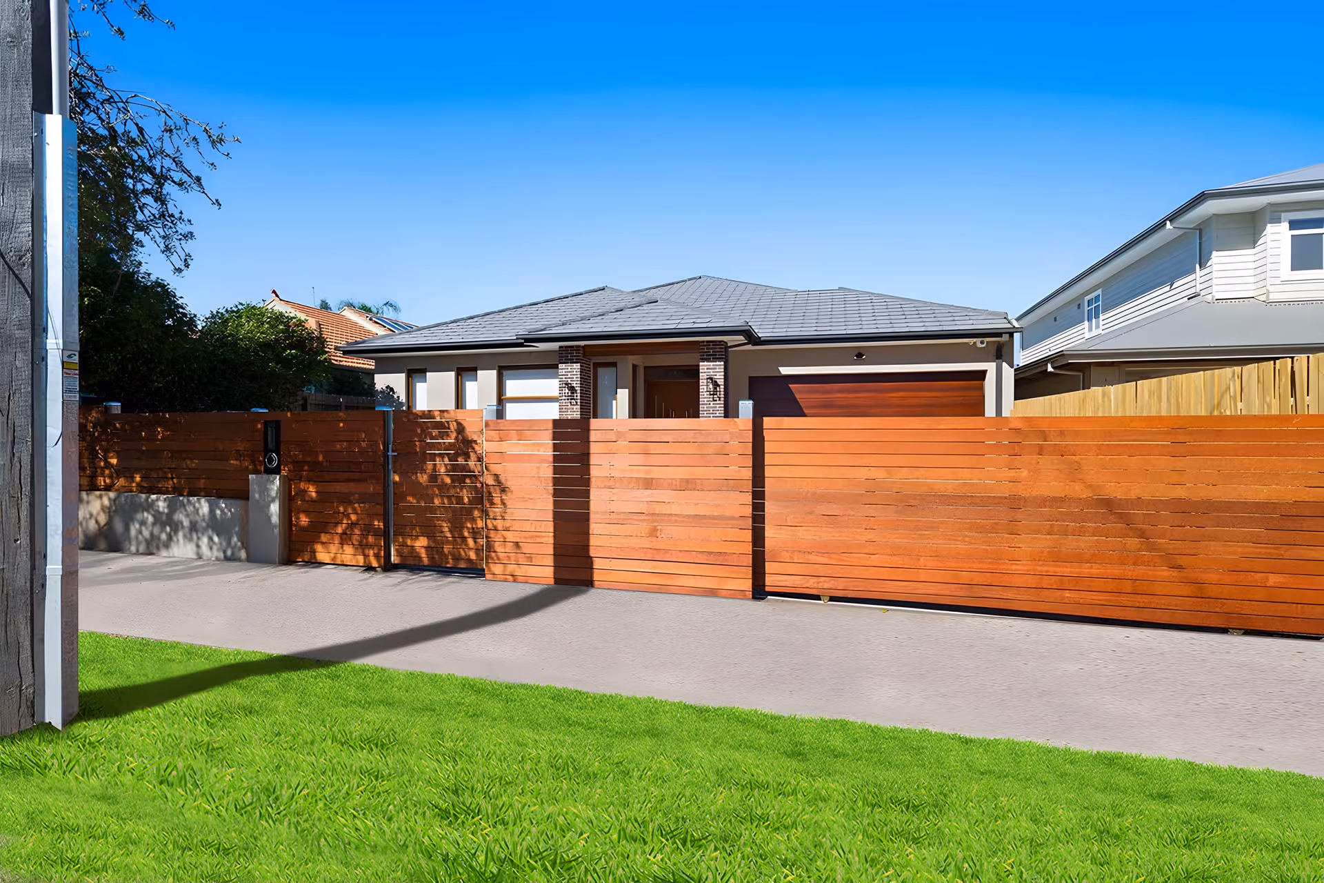 Ross Street townhouses behind a timber batten fence